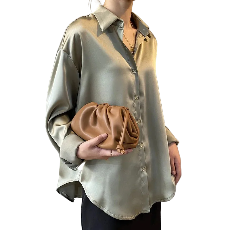 Apricot-colored long sleeve blouse by mjlovers, featuring a stylish and comfortable design with a flowy fit and elegant details.