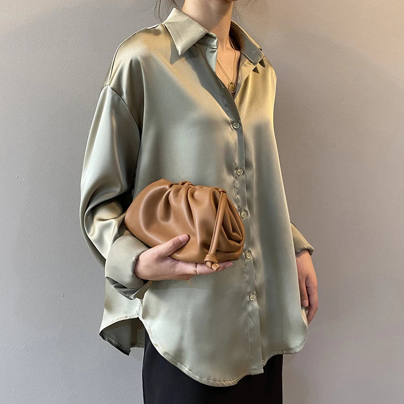 Apricot long sleeve blouse by mjlovers featuring lightweight fabric and a relaxed fit, displayed on a hanger.