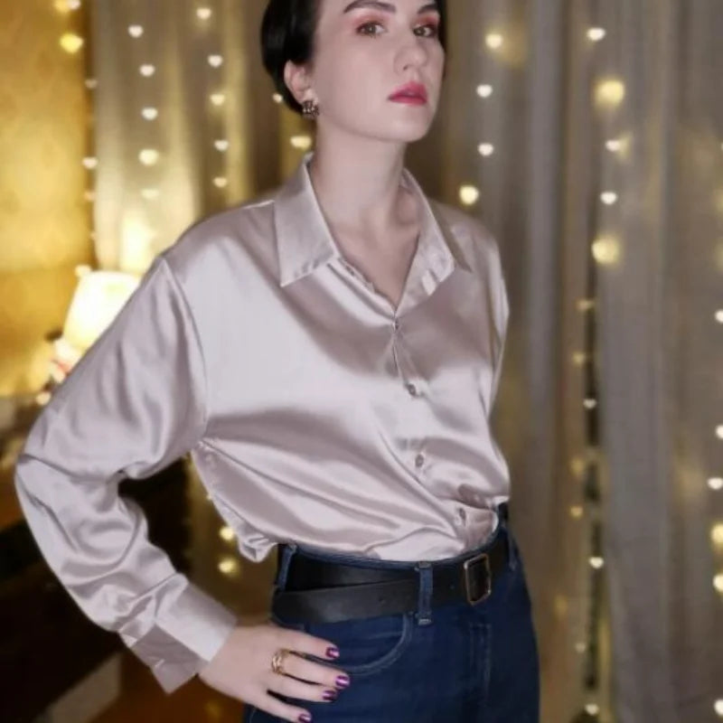 Apricot long sleeve blouse by mjlovers featuring a relaxed fit and elegant design, shown on a model with subtle details.
