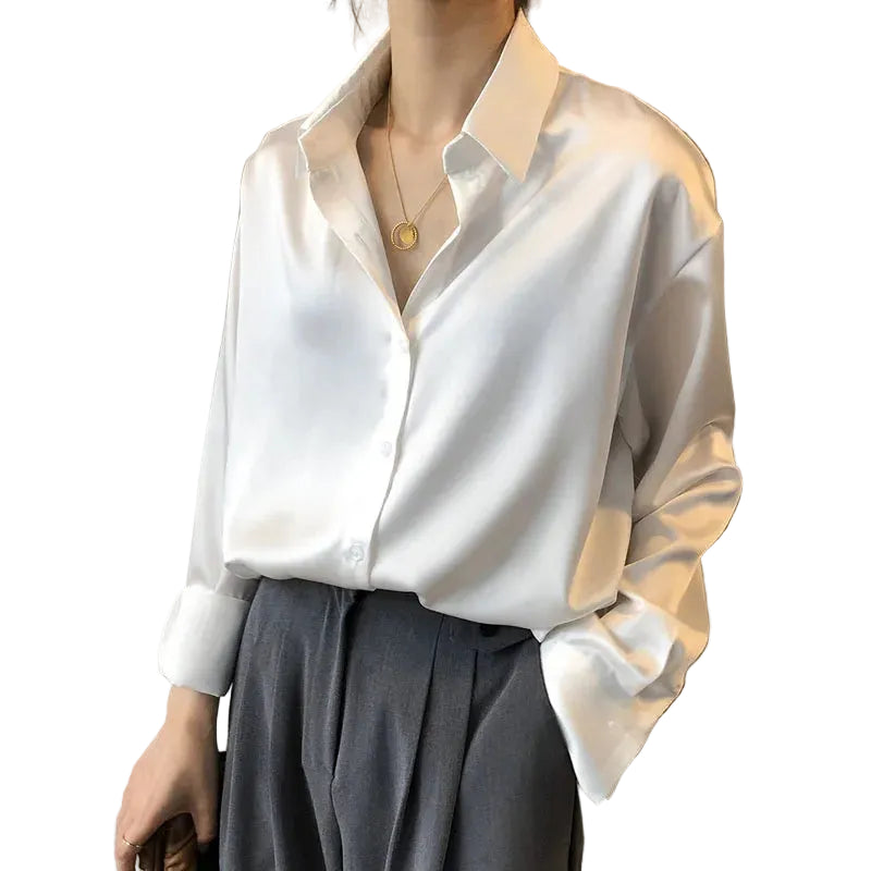Mjlovers apricot long sleeve blouse with a relaxed fit and soft fabric, displayed on a hanger against a neutral background.