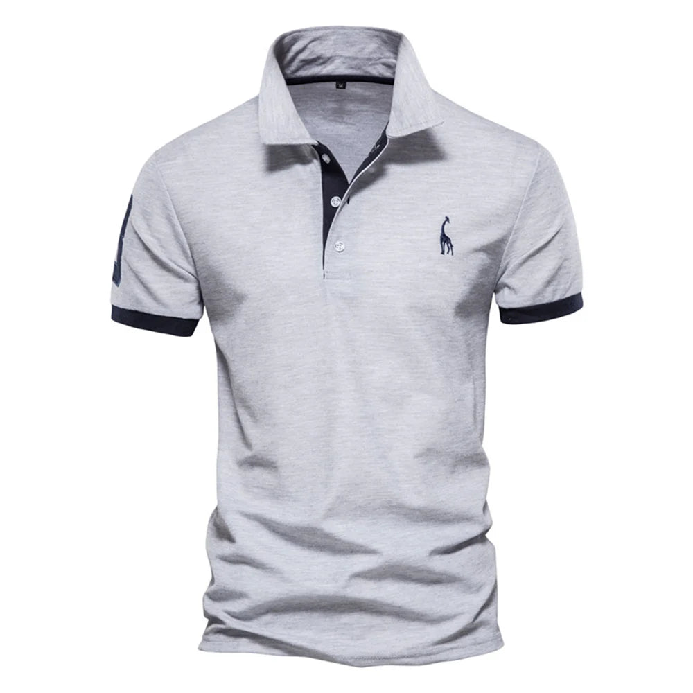 Men's polo shirt by mjlovers featuring a classic design, with a collar and short sleeves, shown in a neutral color.