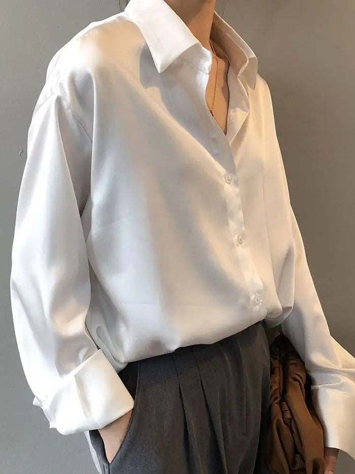 Apricot long sleeve blouse by mjlovers with a relaxed fit and stylish design, shown on a model.