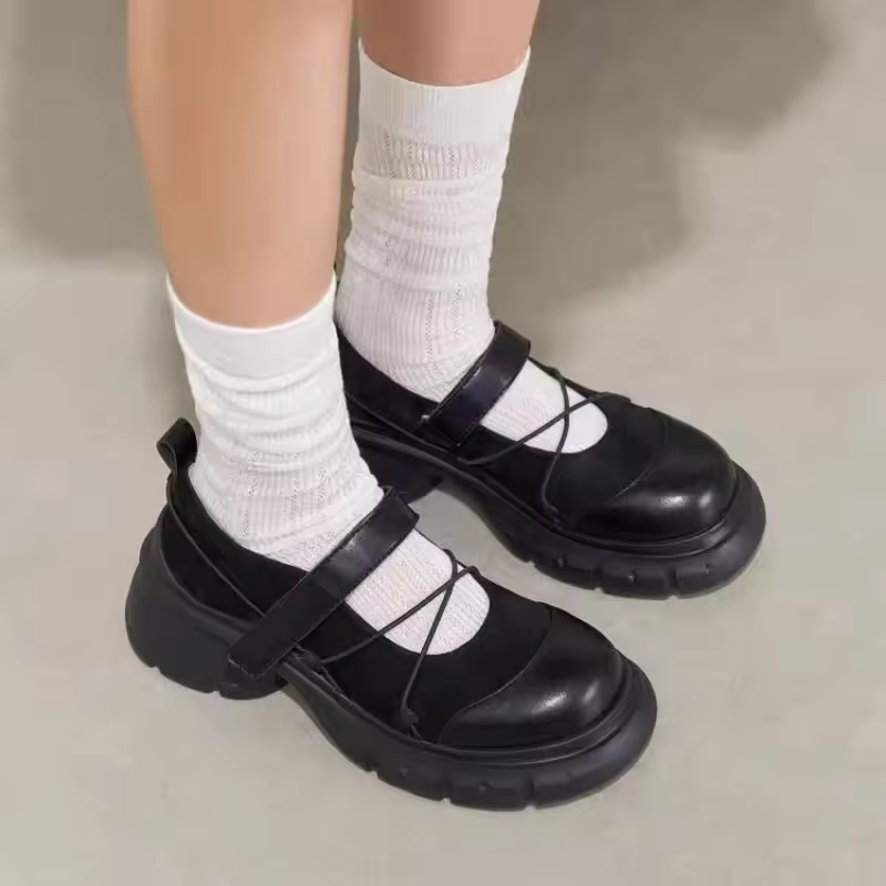 Mjlovers crisscross strap chunky heel shoes featuring a stylish design and ankle straps, shown in a close-up image.