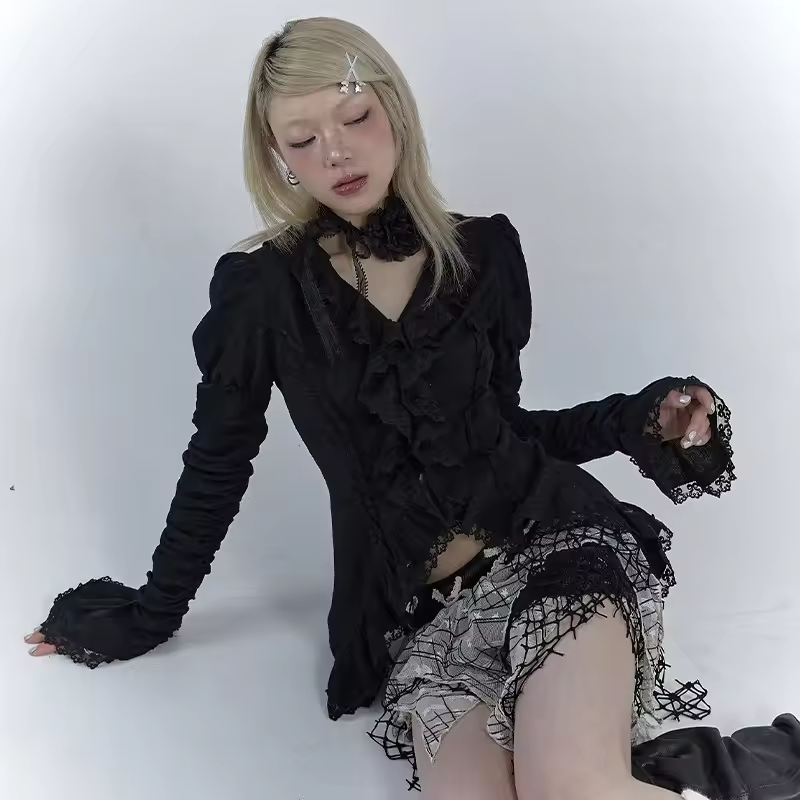 Black lace blouse for women by mjlovers, featuring intricate lace details and a stylish fit, shown on a hanger.