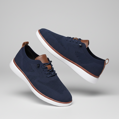 Men lace-up shoes by mjlovers in black leather with stylish stitching and modern design, displayed on a white background.