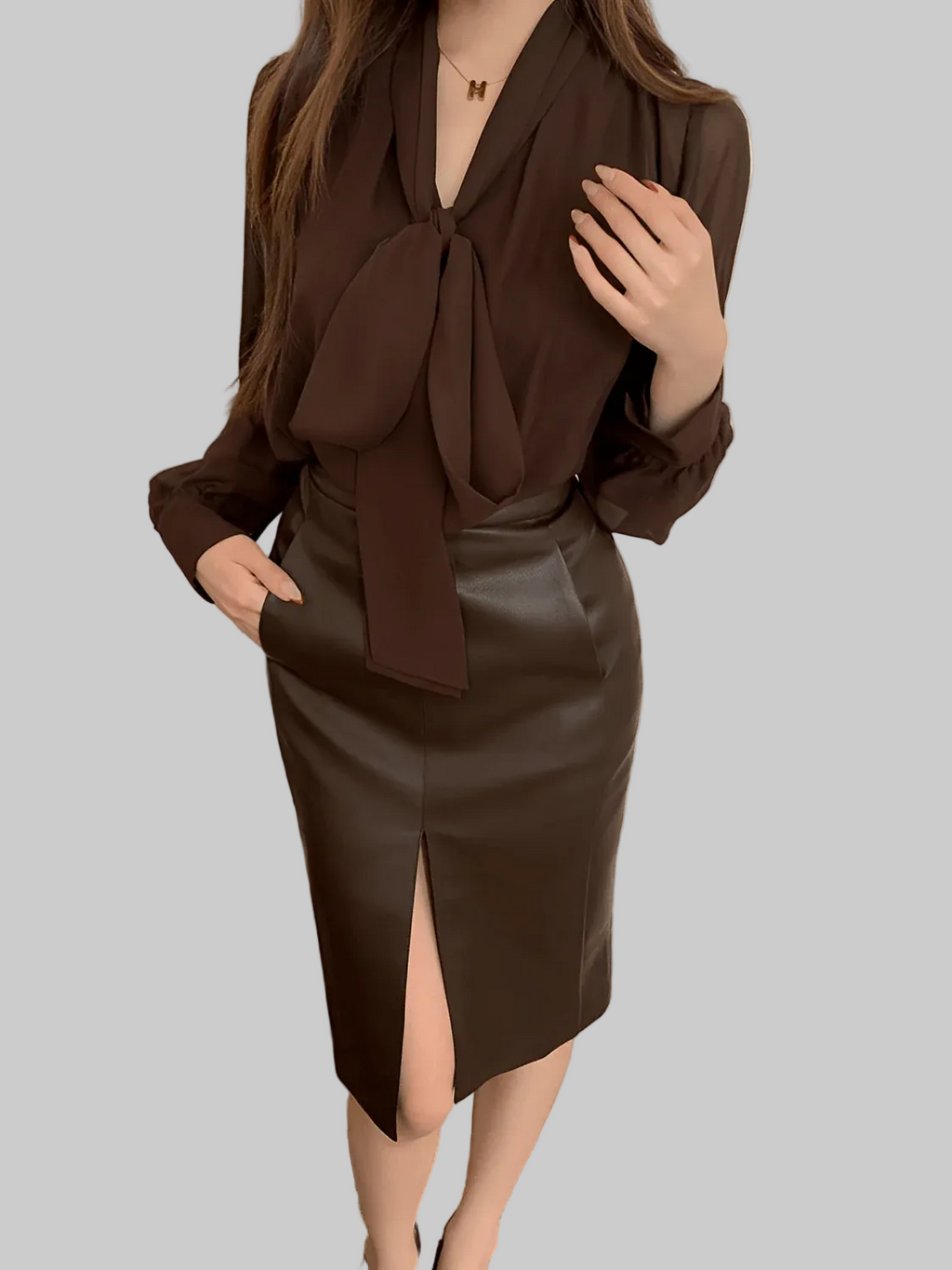 Elegant loose women's business shirt by mjlovers, featuring a relaxed fit with a classic collar and long sleeves.