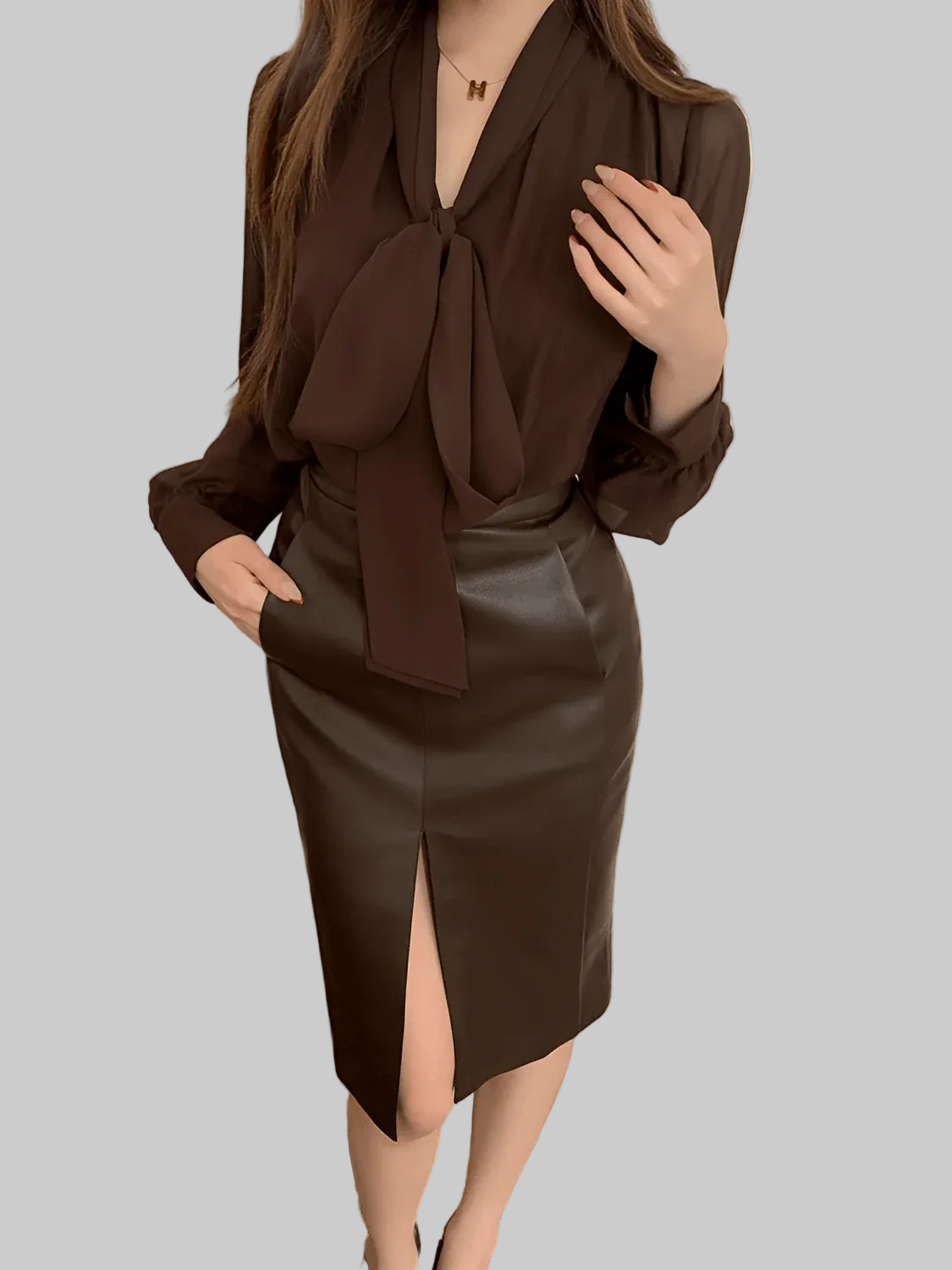 Elegant loose women's business shirt by mjlovers, featuring a relaxed fit with a classic collar and long sleeves.